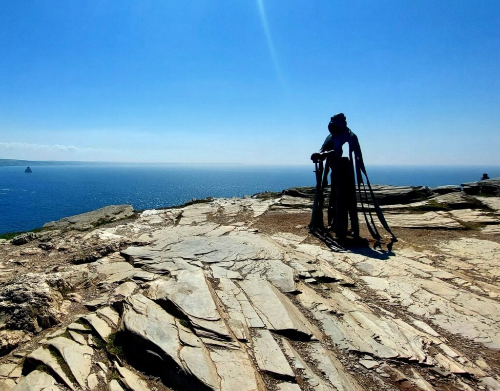 metal statue of King Arthur called Gallos overlooking the sea at Tintagel